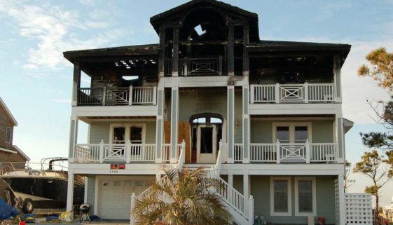 beach house in need of fire damage restoration