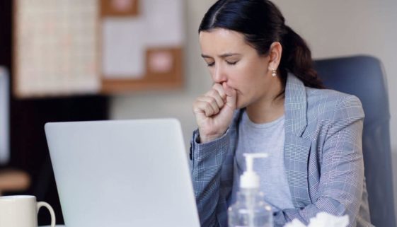 woman coughing air quality testing