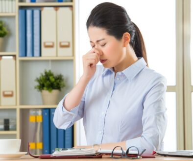 Sick Office Worker Who Needs to Get Your Business Ready for Flu Season